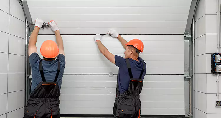 Garage Door Bottom Panel Repair in Pinewood, FL